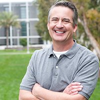 casual portrait of a mature, happy man