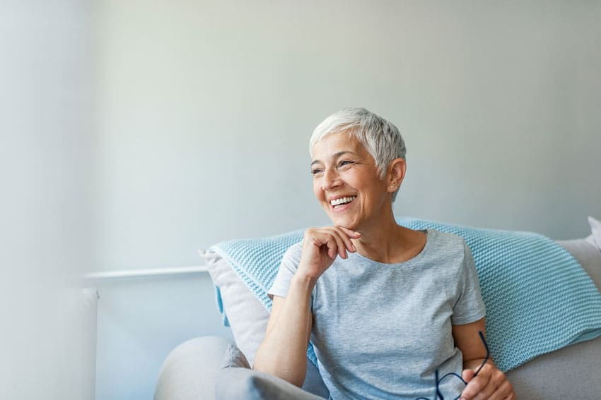 dental-implant-supported-dentures senior woman smiling