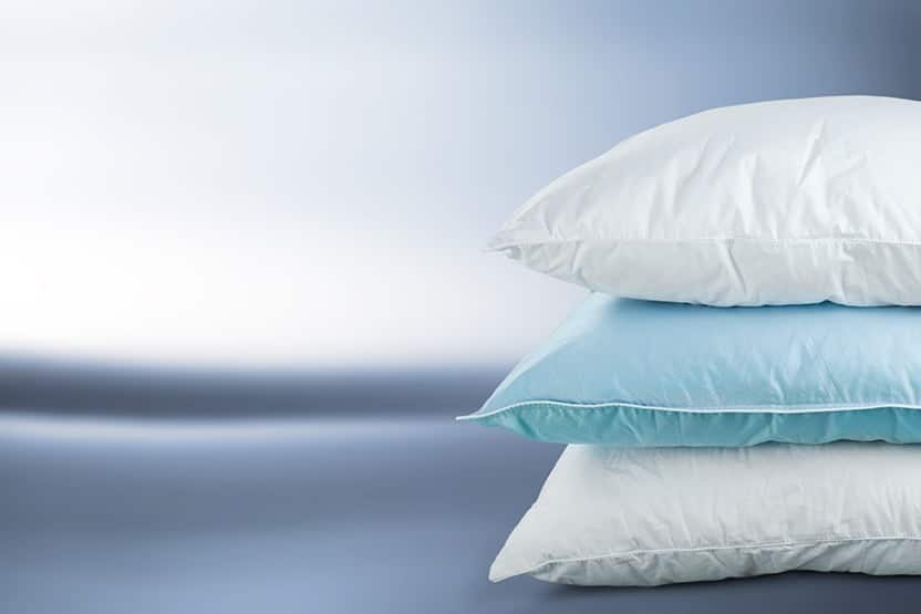 3 pillows stacked on top of each other. Your pillow may be soft and feathery, just how you like it as you sleep, but if it’s too fluffy, too soft or too firm, your spine is probably out of alignment and you’re more likely to snore. 